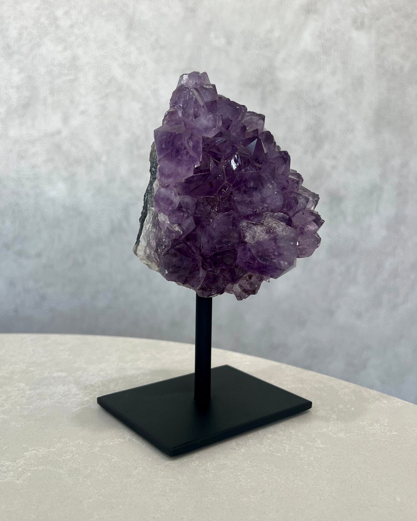 AMETHYST CLUSTER ON STAND 01