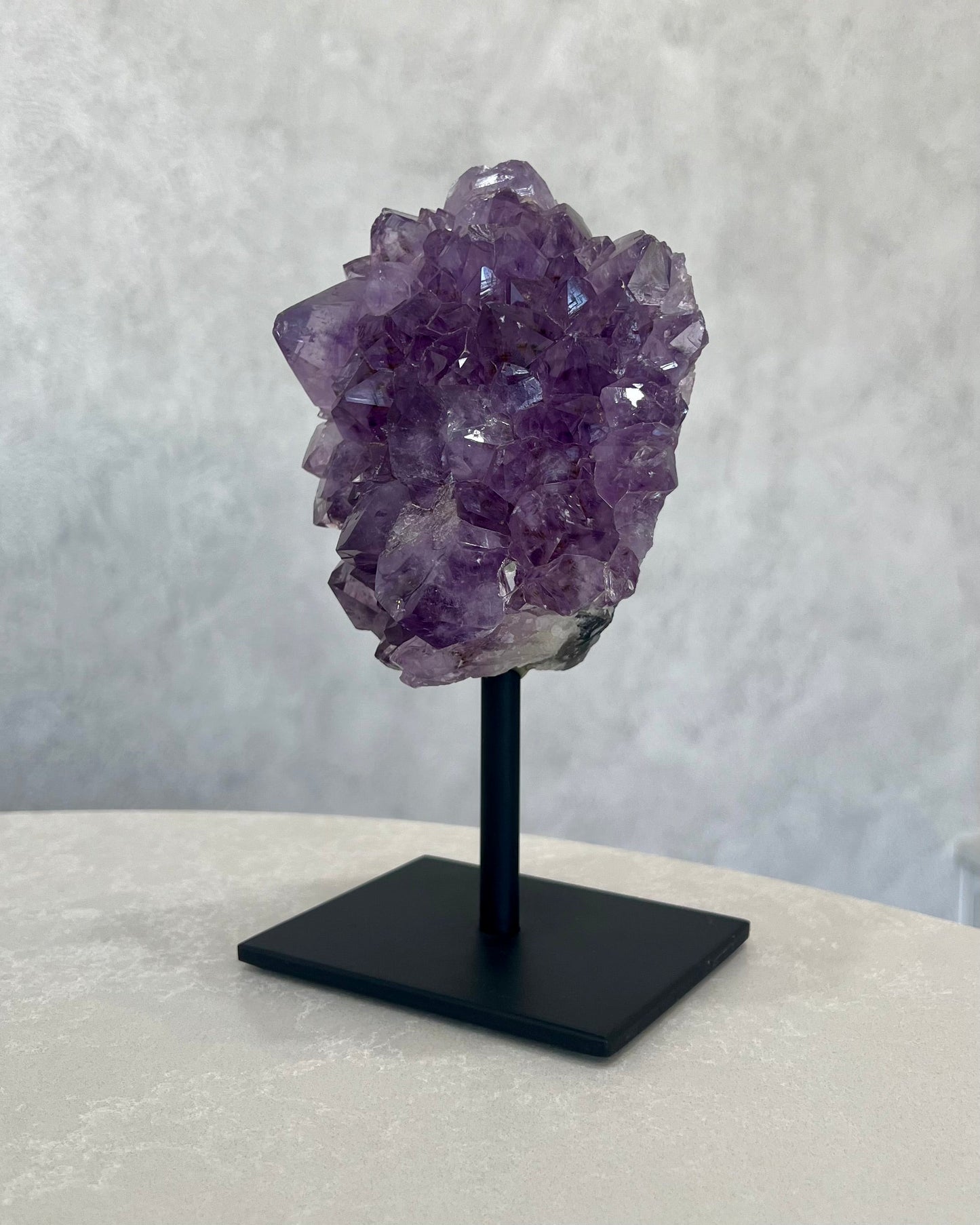 AMETHYST CLUSTER ON STAND 01