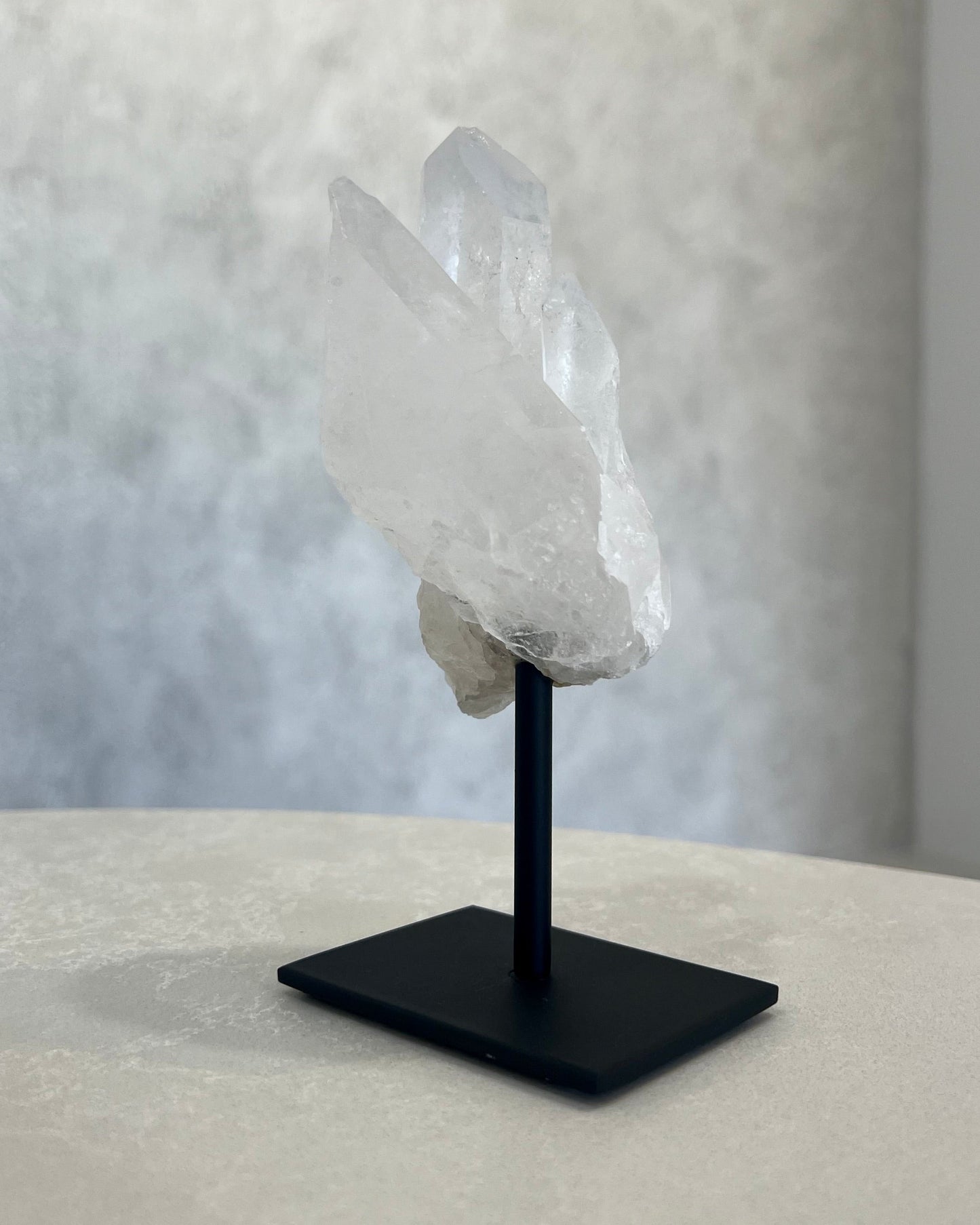 CLEAR QUARTZ CLUSTER ON STAND 03